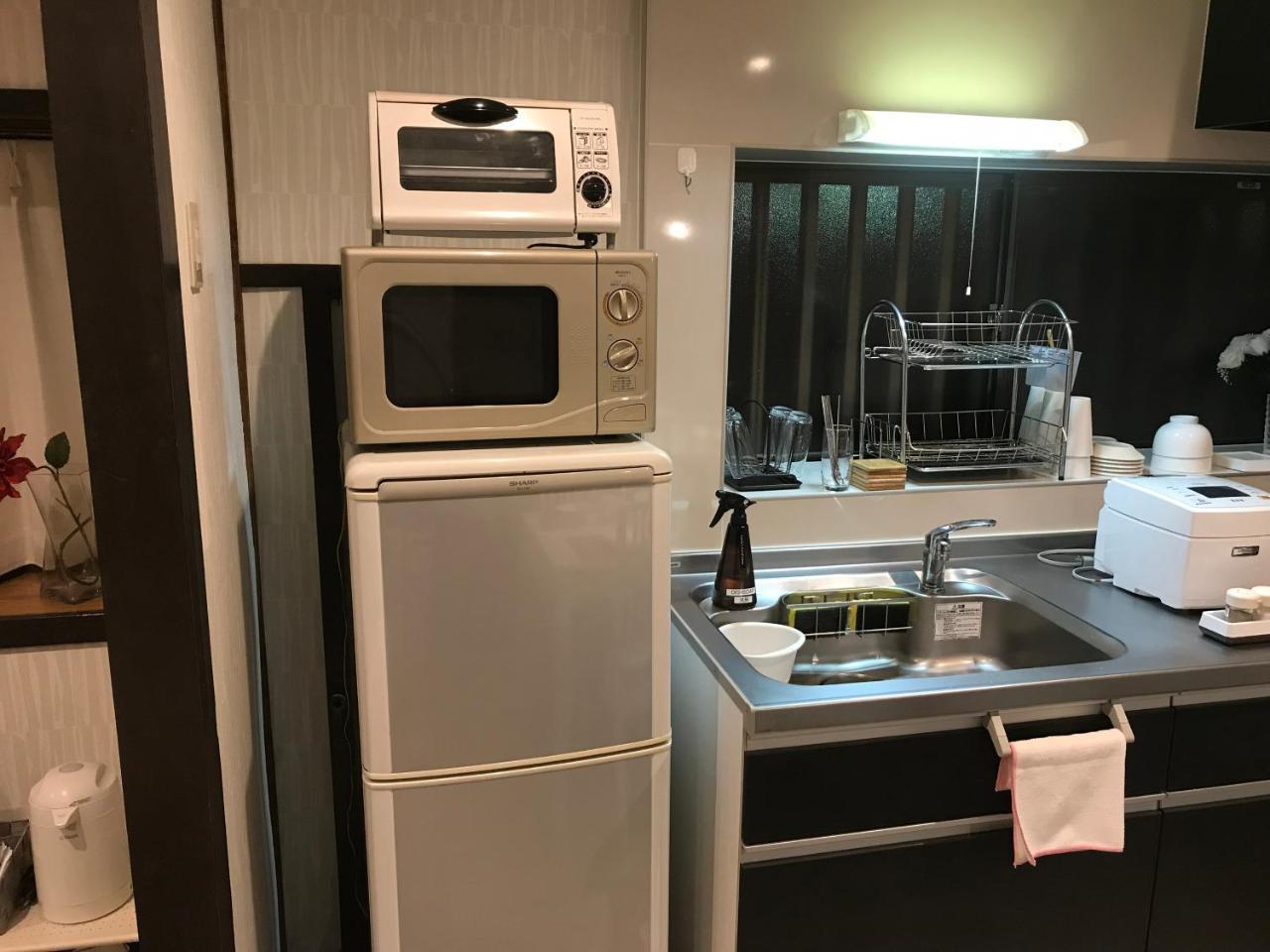 Family House Apartment โอซาก้า ภายนอก รูปภาพ