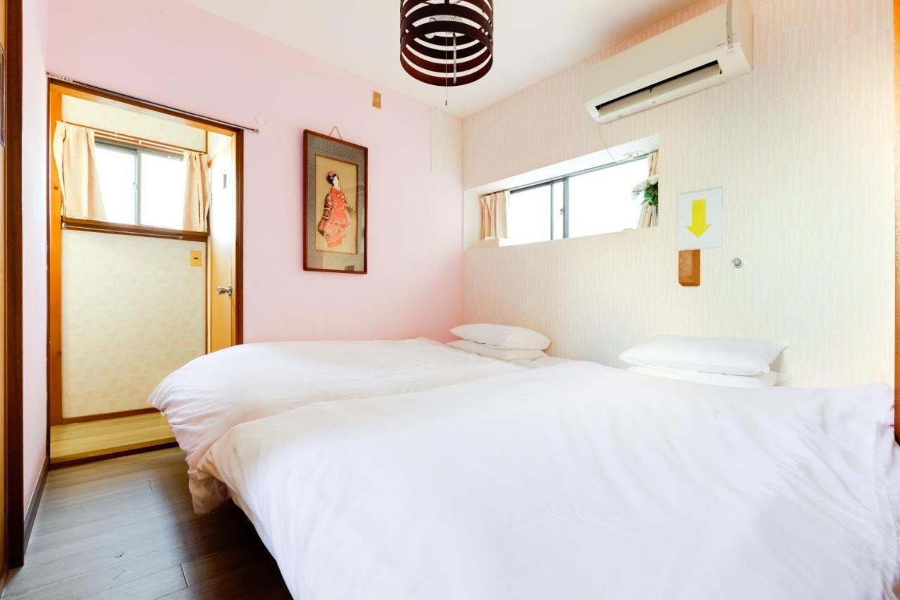 Family House Apartment โอซาก้า ภายนอก รูปภาพ