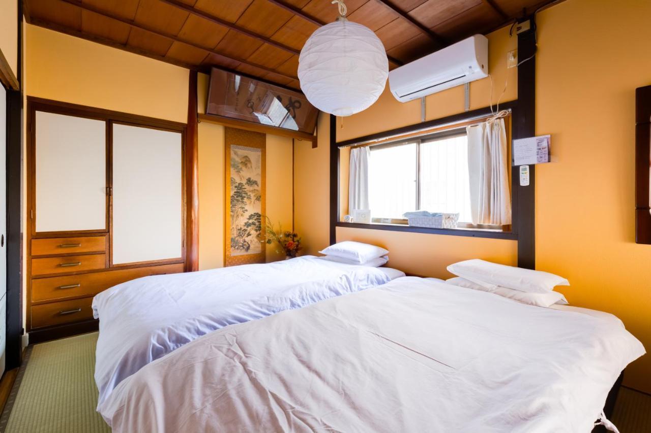 Family House Apartment โอซาก้า ภายนอก รูปภาพ