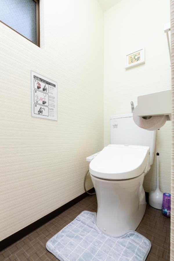 Family House Apartment โอซาก้า ภายนอก รูปภาพ