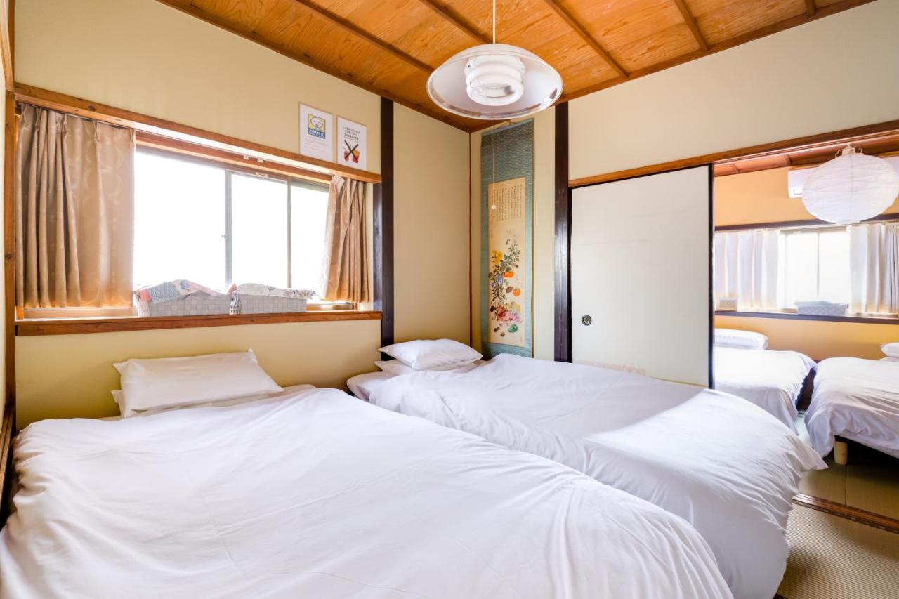 Family House Apartment โอซาก้า ภายนอก รูปภาพ