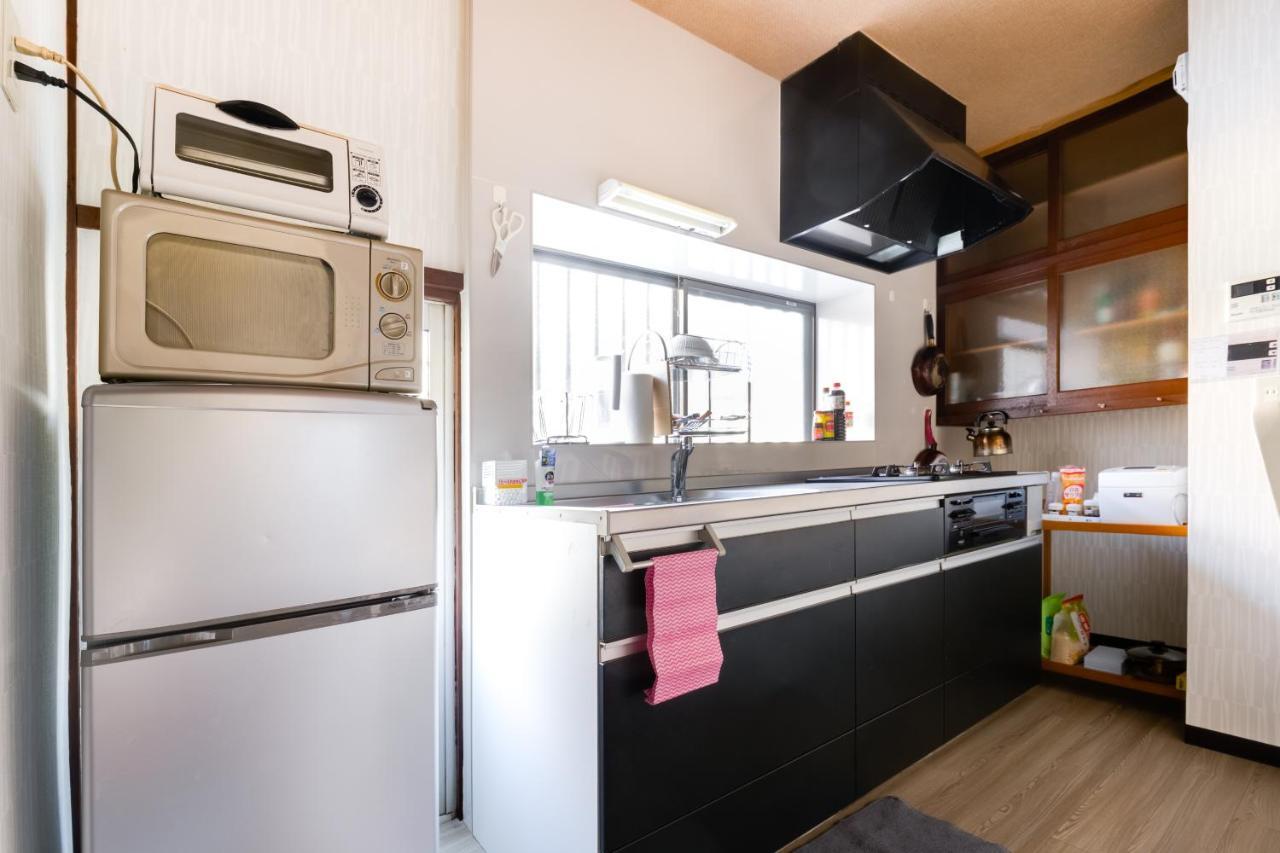 Family House Apartment โอซาก้า ภายนอก รูปภาพ