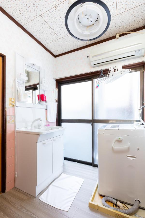 Family House Apartment โอซาก้า ภายนอก รูปภาพ